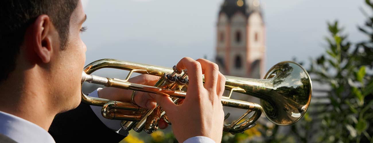 Boy plays the trumpet